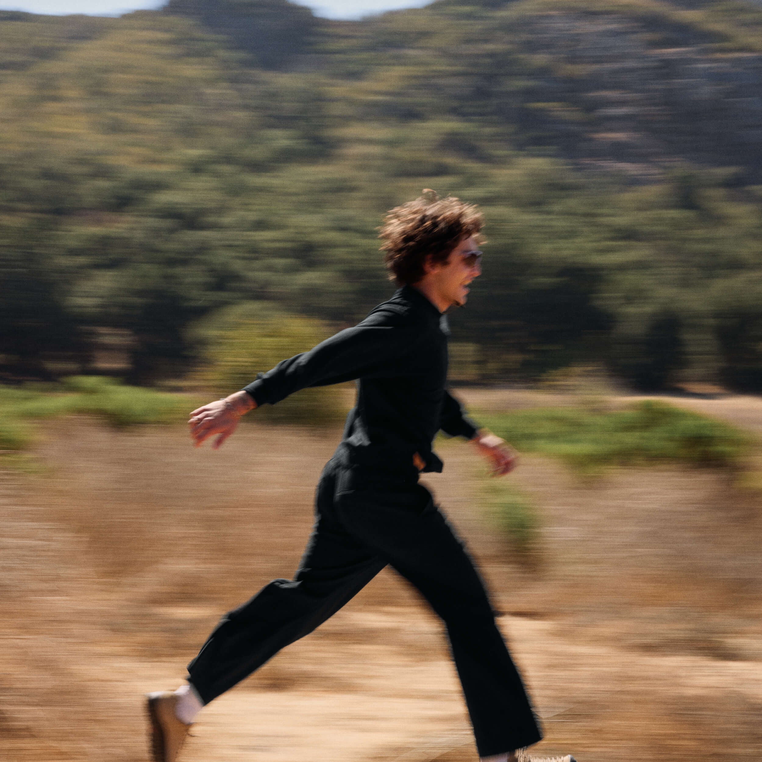 CahuengaLSCrew_Black_Can_Medium_Lifestyle_LarchmontFlare-legPant.jpg